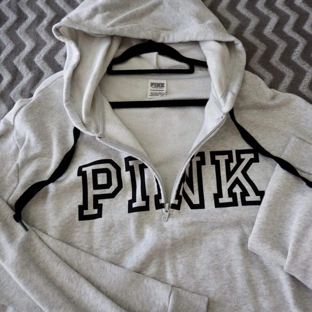 Pink VS half-zip hoodie.